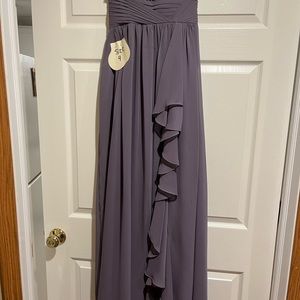 Lilac gown strapless but has straps in bag that were never used. Size 4